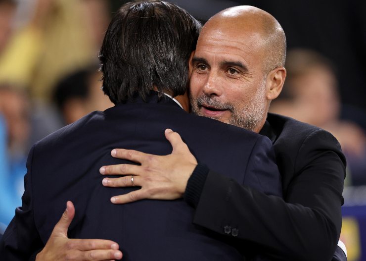 Pep Guardiola abbraccia Simone Inzaghi